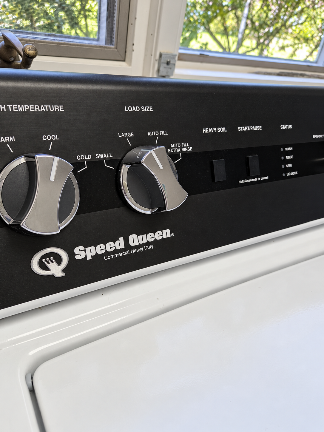 Speed Queen washer controls set for a hot large Heavy Soil Heavy Duty cleaning cycle